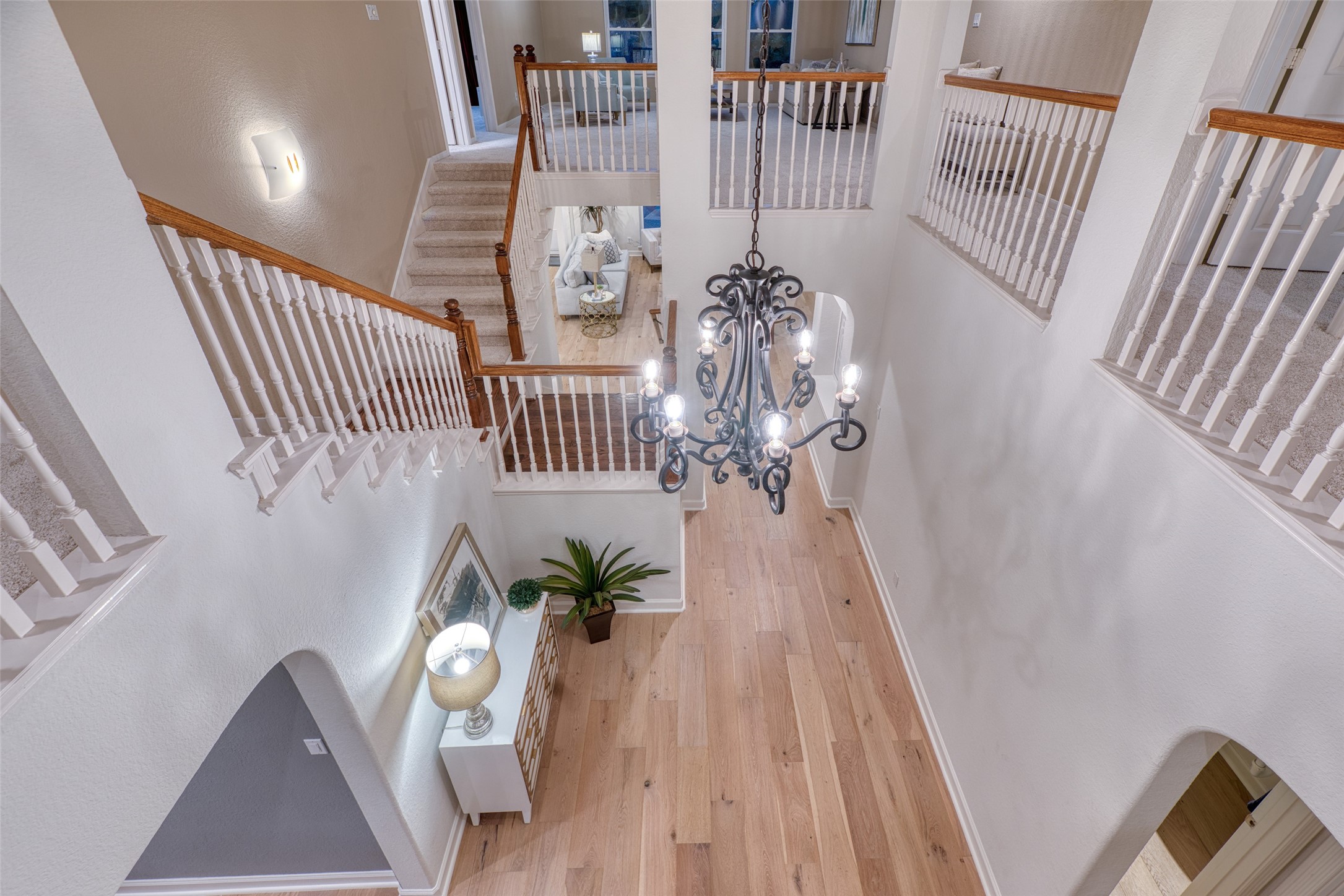 19303 Allview Lane Houston, TX 77094 - Photo 31 of 50 Dramatic view of the two-story foyer and chandelier from above.
