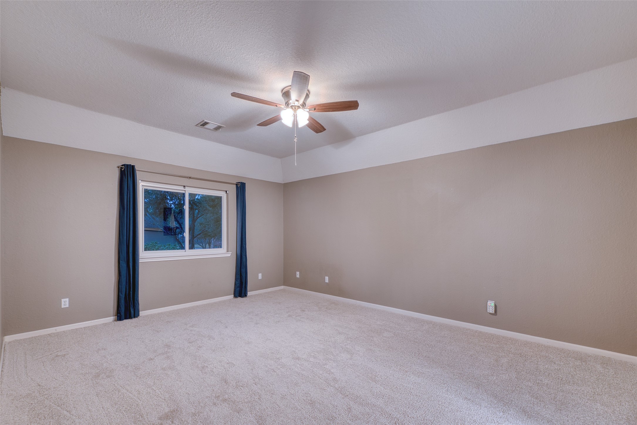 19303 Allview Lane Houston, TX 77094 - Photo 41 of 50 Additional bedroom with ceiling fan and soft neutral finishes.
