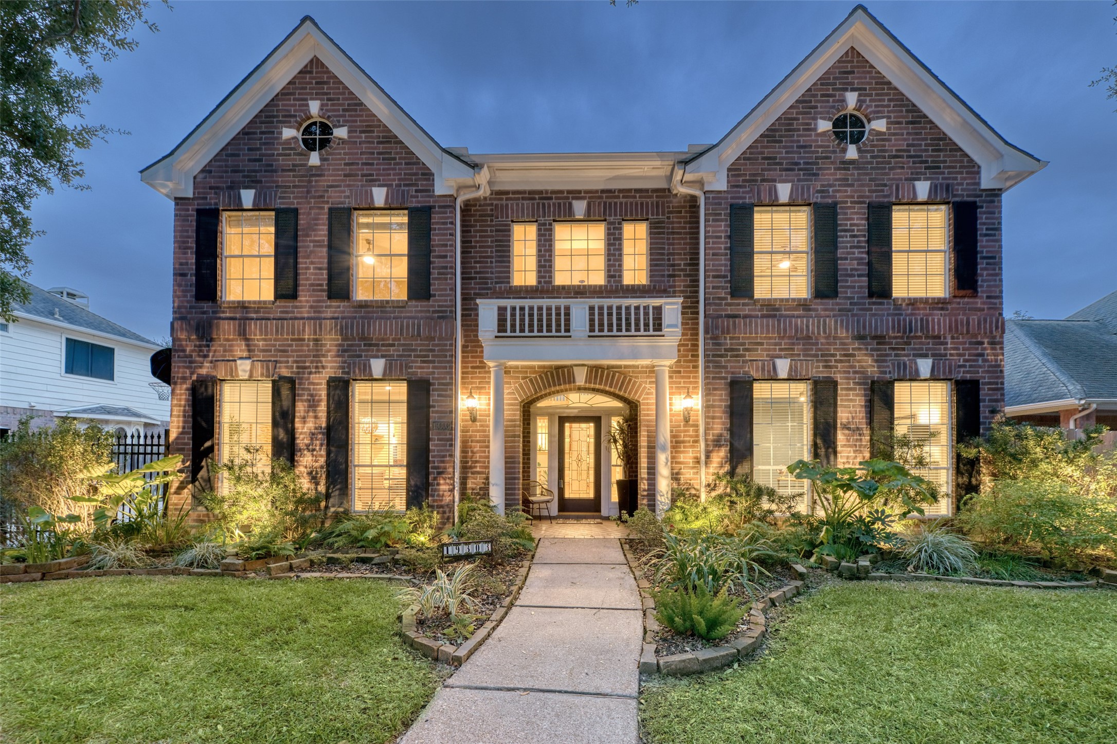 19303 Allview Lane Houston, TX 77094 - Photo 49 of 50 Stunning two-story brick elevation with manicured landscaping and welcoming front walkway.