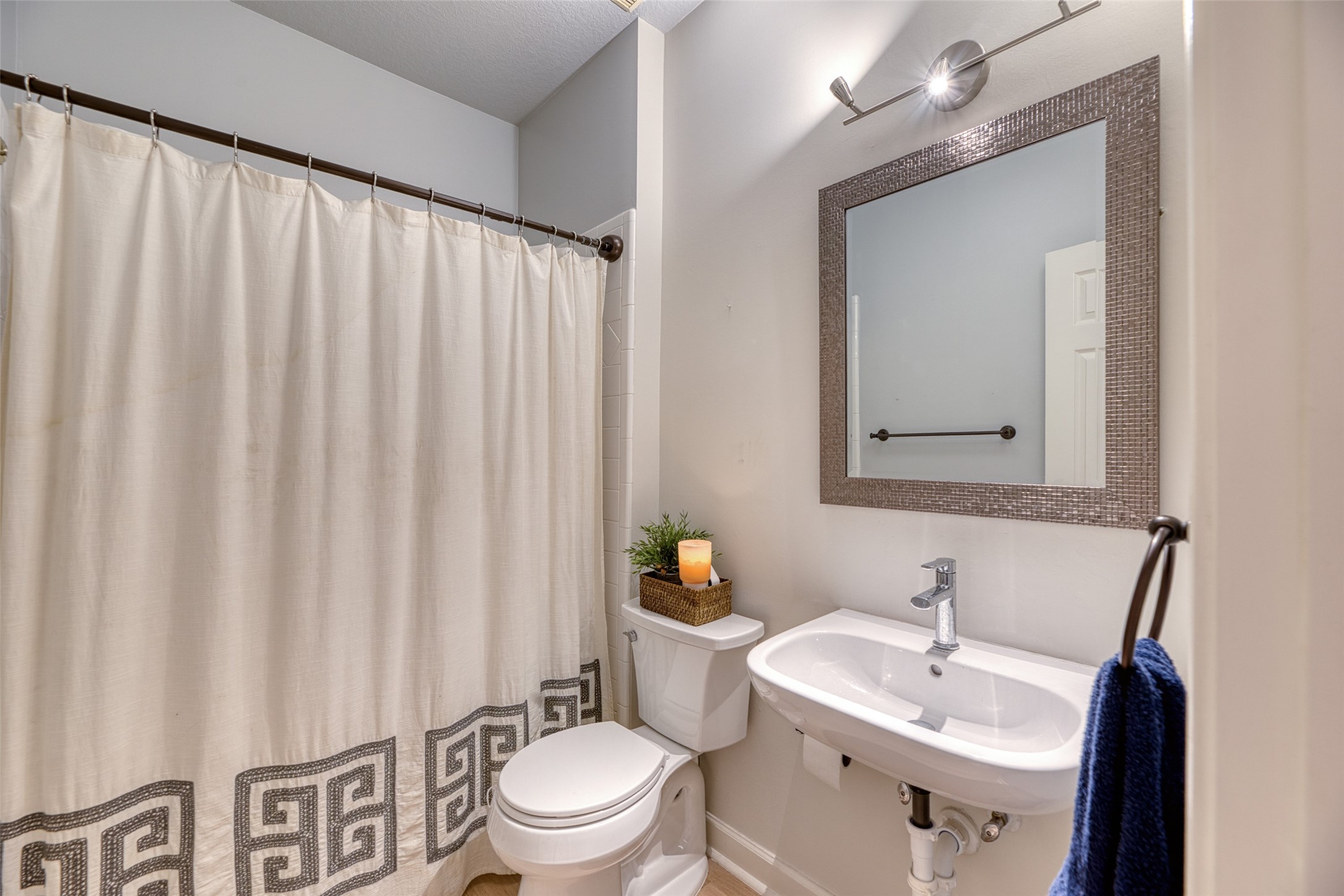 19303 Allview Lane Houston, TX 77094 - Photo 6 of 50 Secondary bathroom with large vanity and tub/shower combo next to second bedroom down.