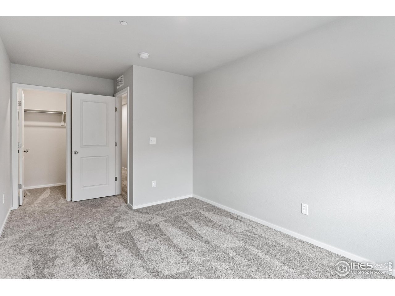 6615 4th St Road, Unit 1 Greeley, CO 80634 - Photo 27 of 31 Bedroom 3 with walk-in closet.