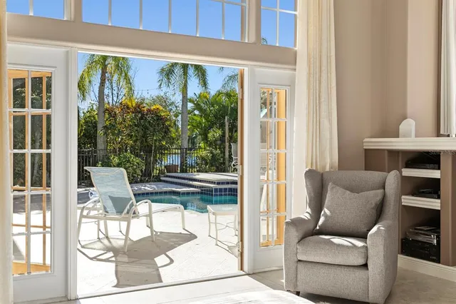 a bathroom with a bathtub and a window
