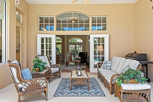 a view of a field with grass and trees