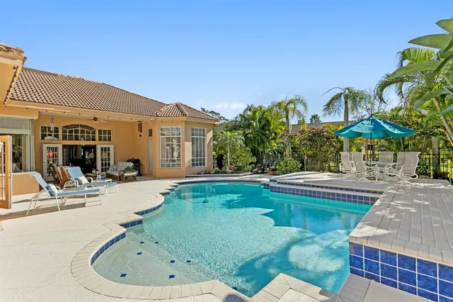 a view of a lake with a building in the background
