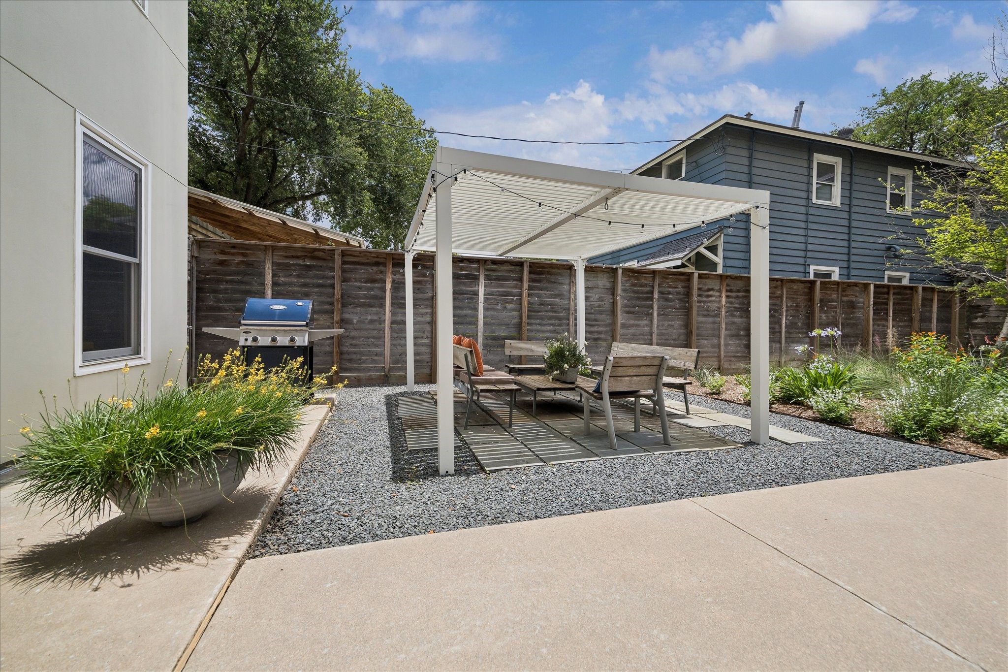 1418 Kipling Street Houston, TX 77006 - Photo 25 of 42 Another view of the pergola from the walkway.