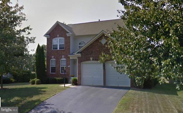 8462 Catia Lane Springfield, VA 22153 - Photo 1 of 3 front view of a house with a yard