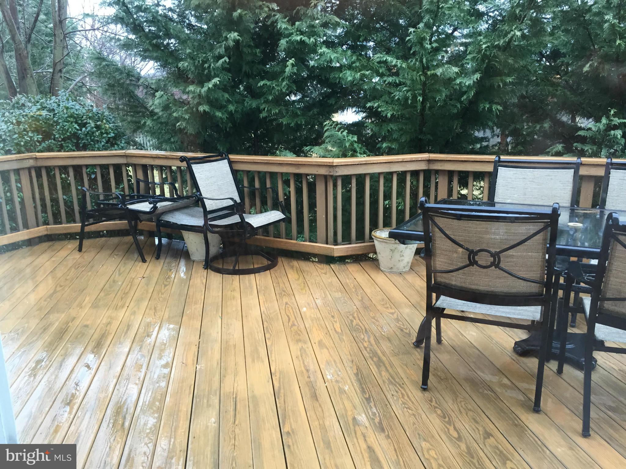 8462 Catia Lane Springfield, VA 22153 - Photo 3 of 3 a view of a deck patio and outdoor seating