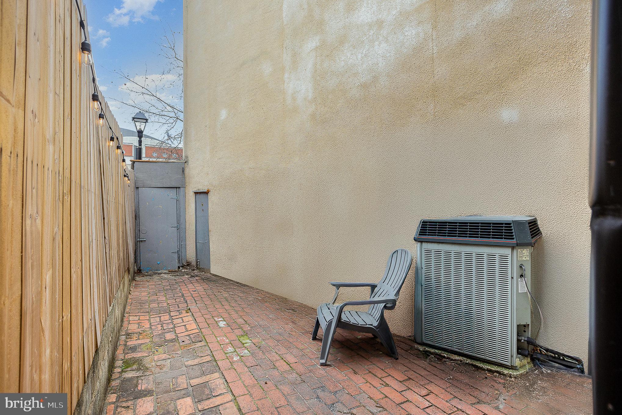 604 Washington Boulevard Baltimore, MD 21230 - Photo 26 of 30 a view of a room with a door and a chair