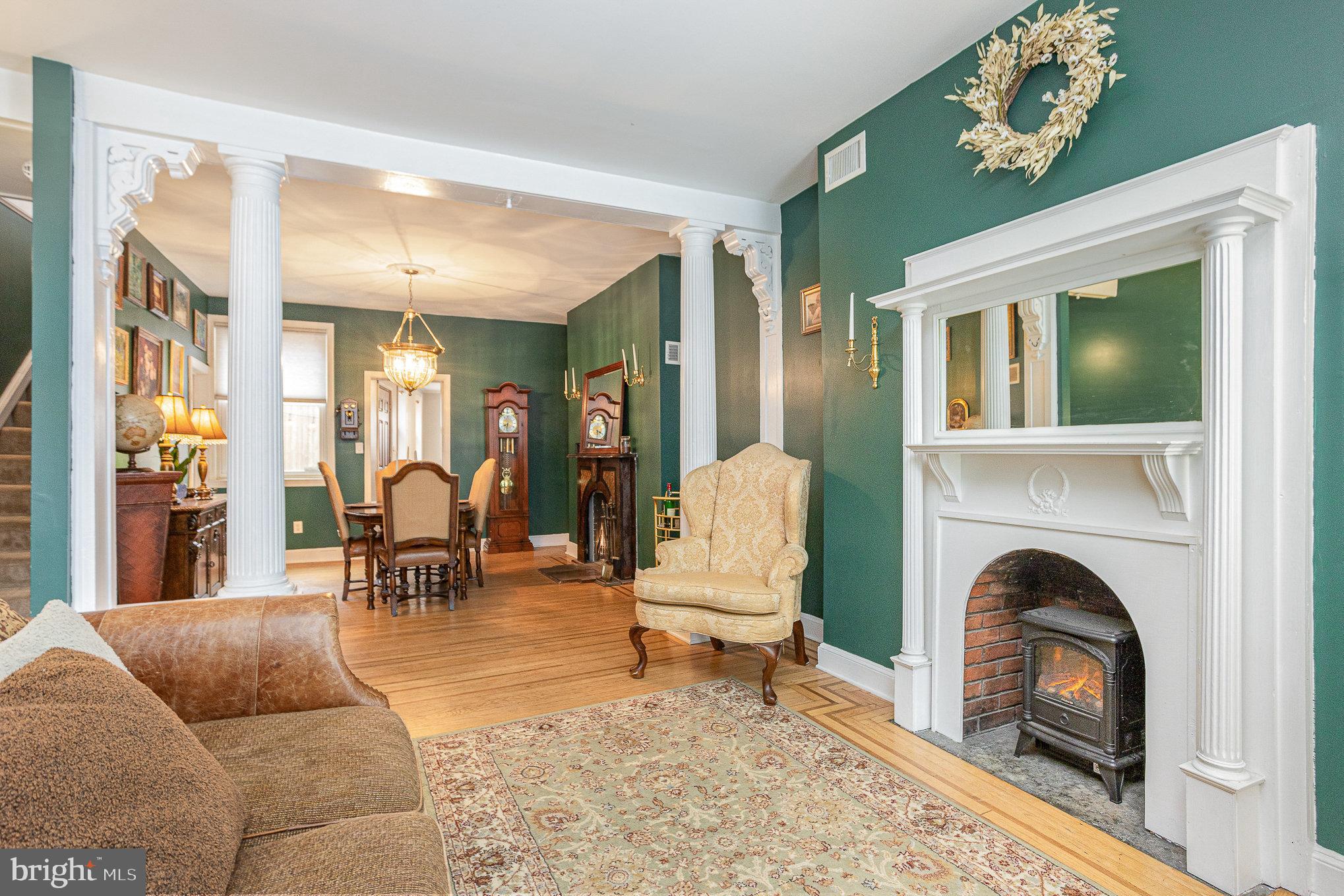 604 Washington Boulevard Baltimore, MD 21230 - Photo 5 of 30 a living room with furniture and a fireplace