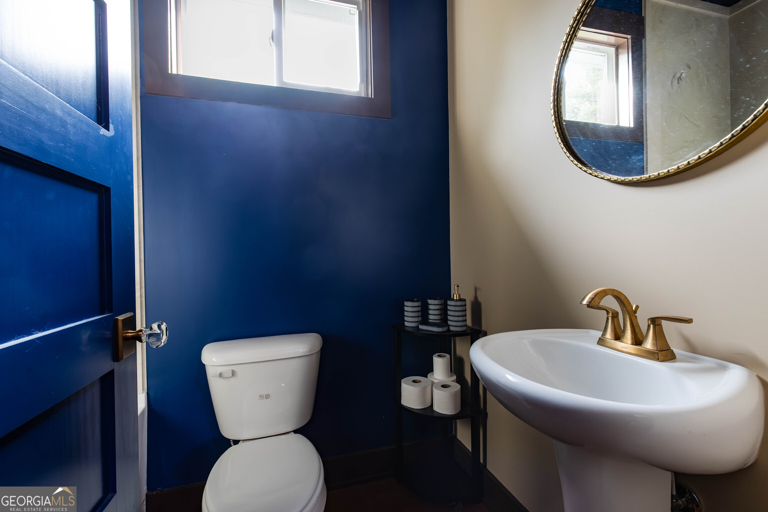 180 South Main Street Ludowici, GA 31316 - Photo 12 of 43 a bathroom with a toilet and a sink