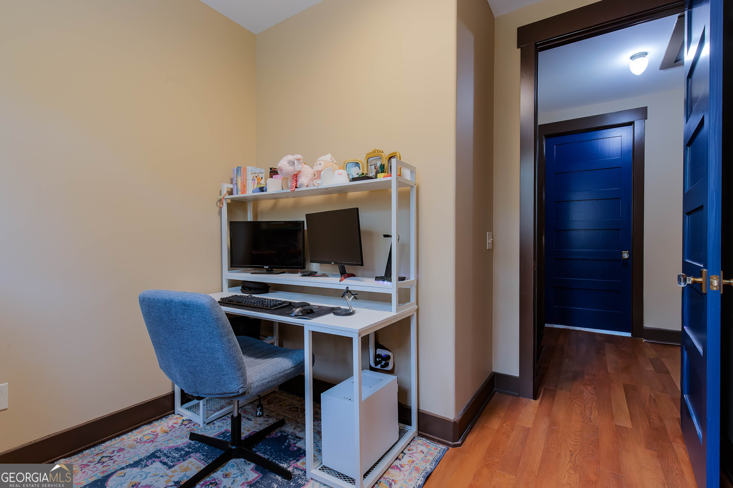 180 South Main Street Ludowici, GA 31316 - Photo 16 of 43 a view of a workspace with furniture and wooden floor