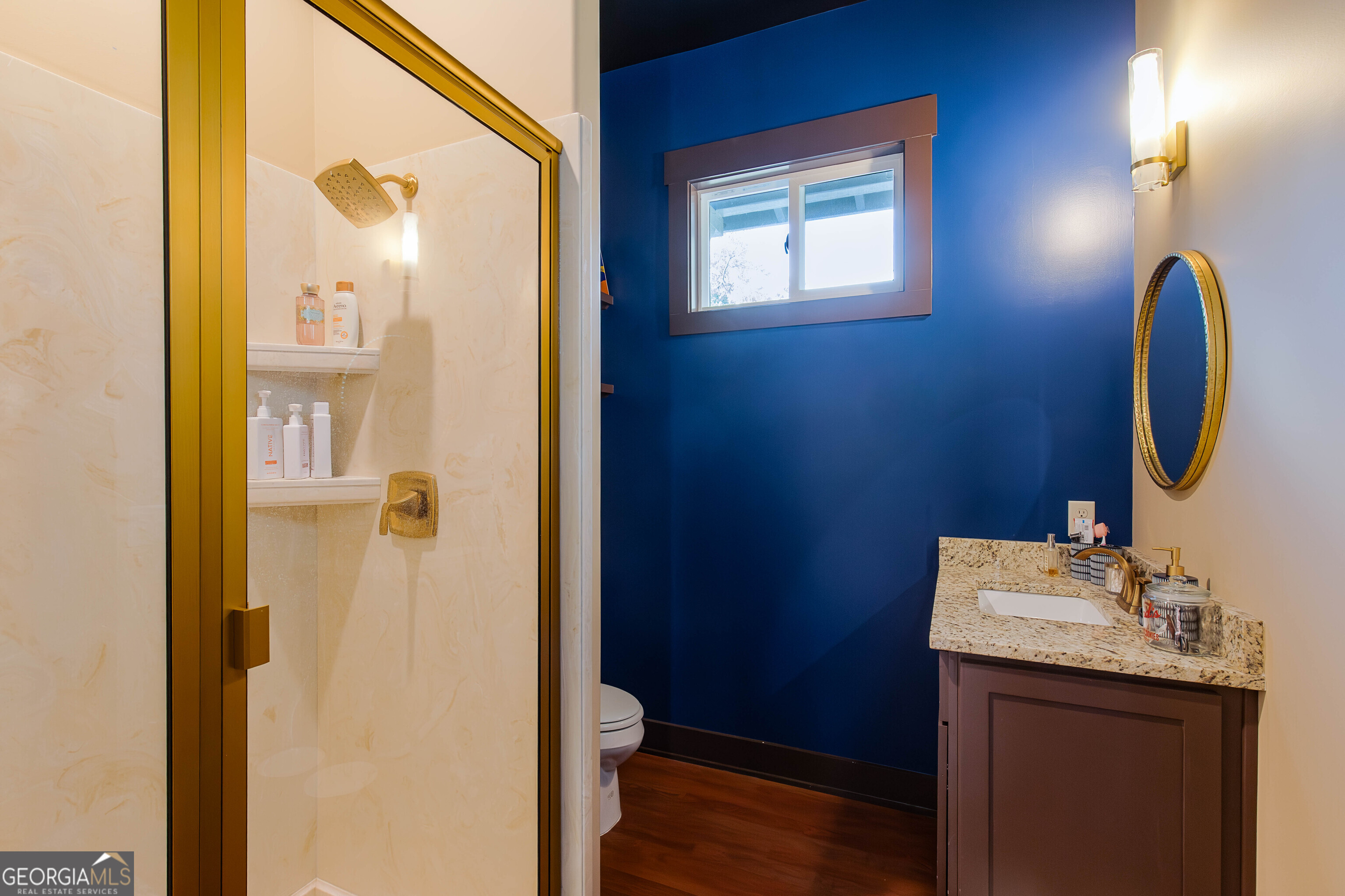 180 South Main Street Ludowici, GA 31316 - Photo 17 of 43 a bathroom with a sink vanity and a mirror