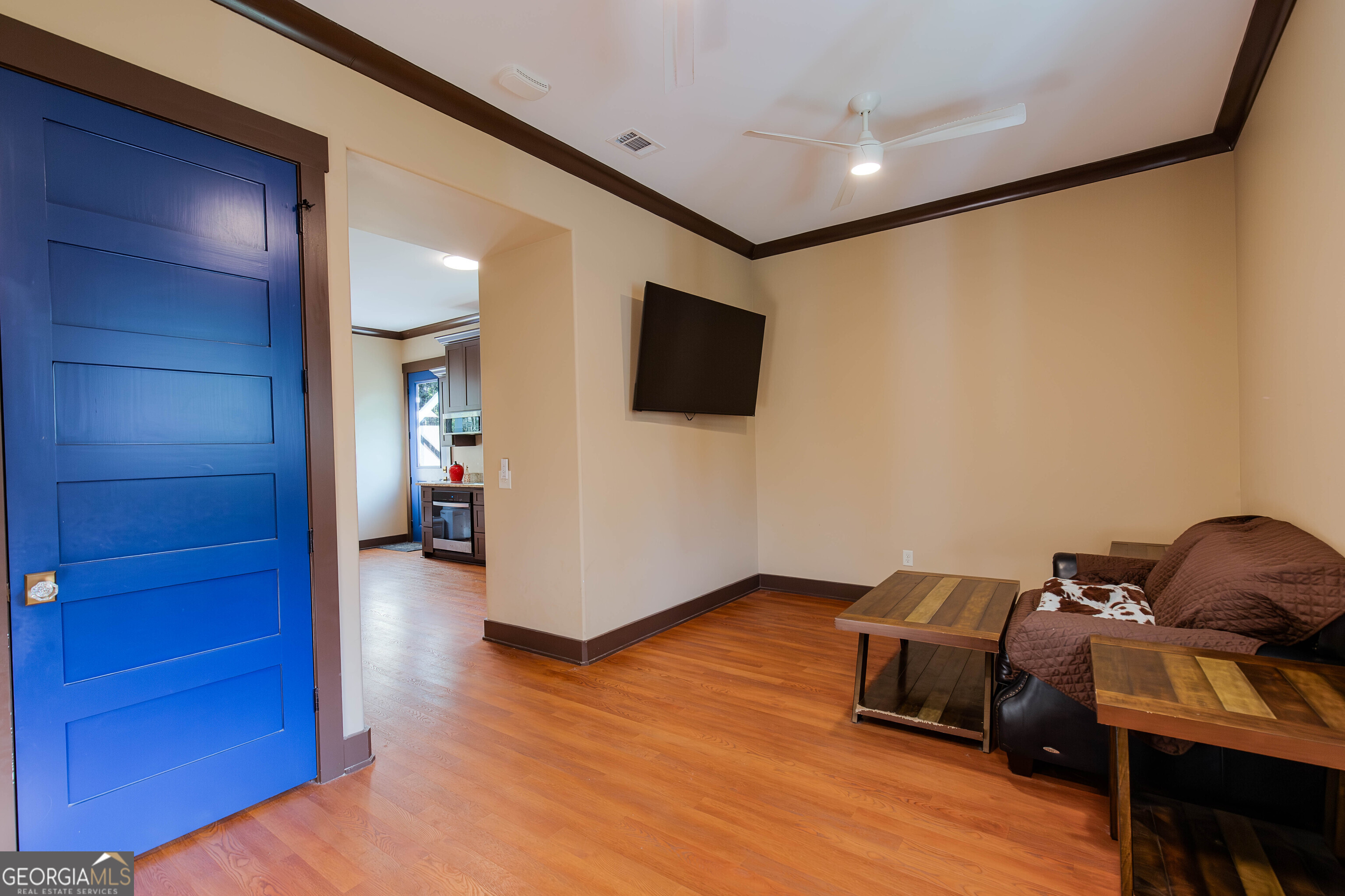 180 South Main Street Ludowici, GA 31316 - Photo 20 of 43 a livingroom with furniture and a flat screen tv