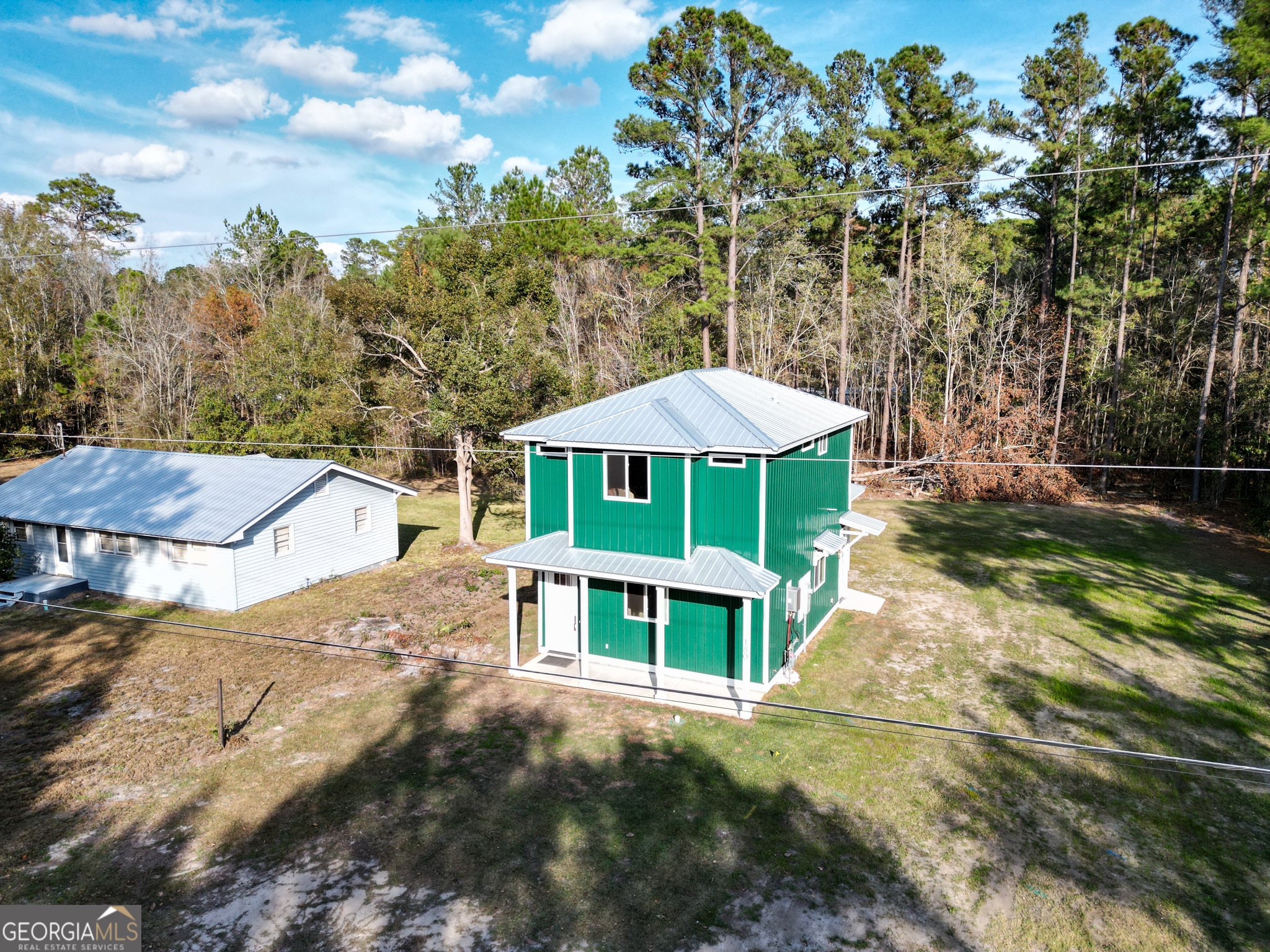 180 South Main Street Ludowici, GA 31316 - Photo 25 of 43 a view of a house with a yard
