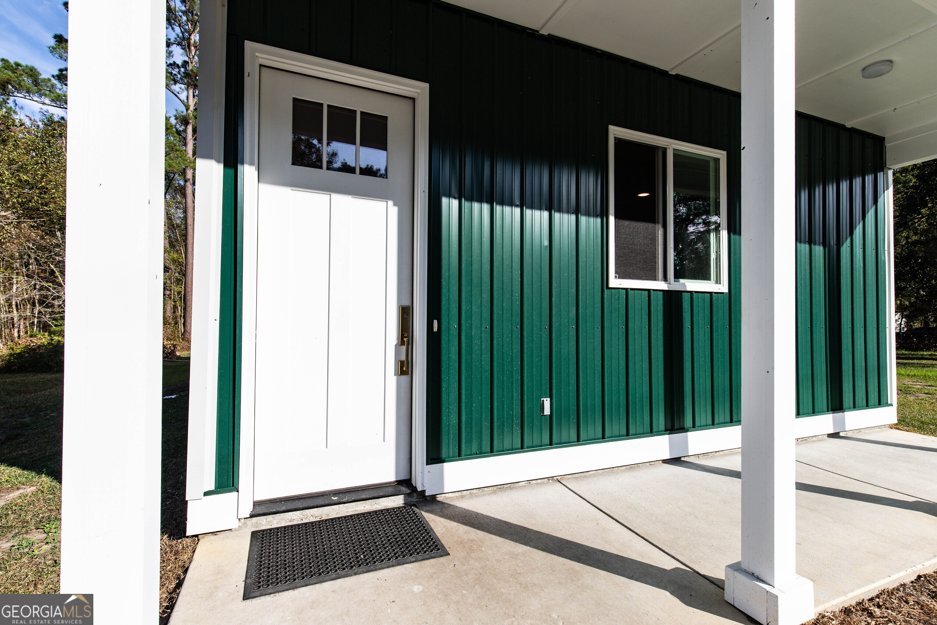 180 South Main Street Ludowici, GA 31316 - Photo 36 of 43 a picture of a door