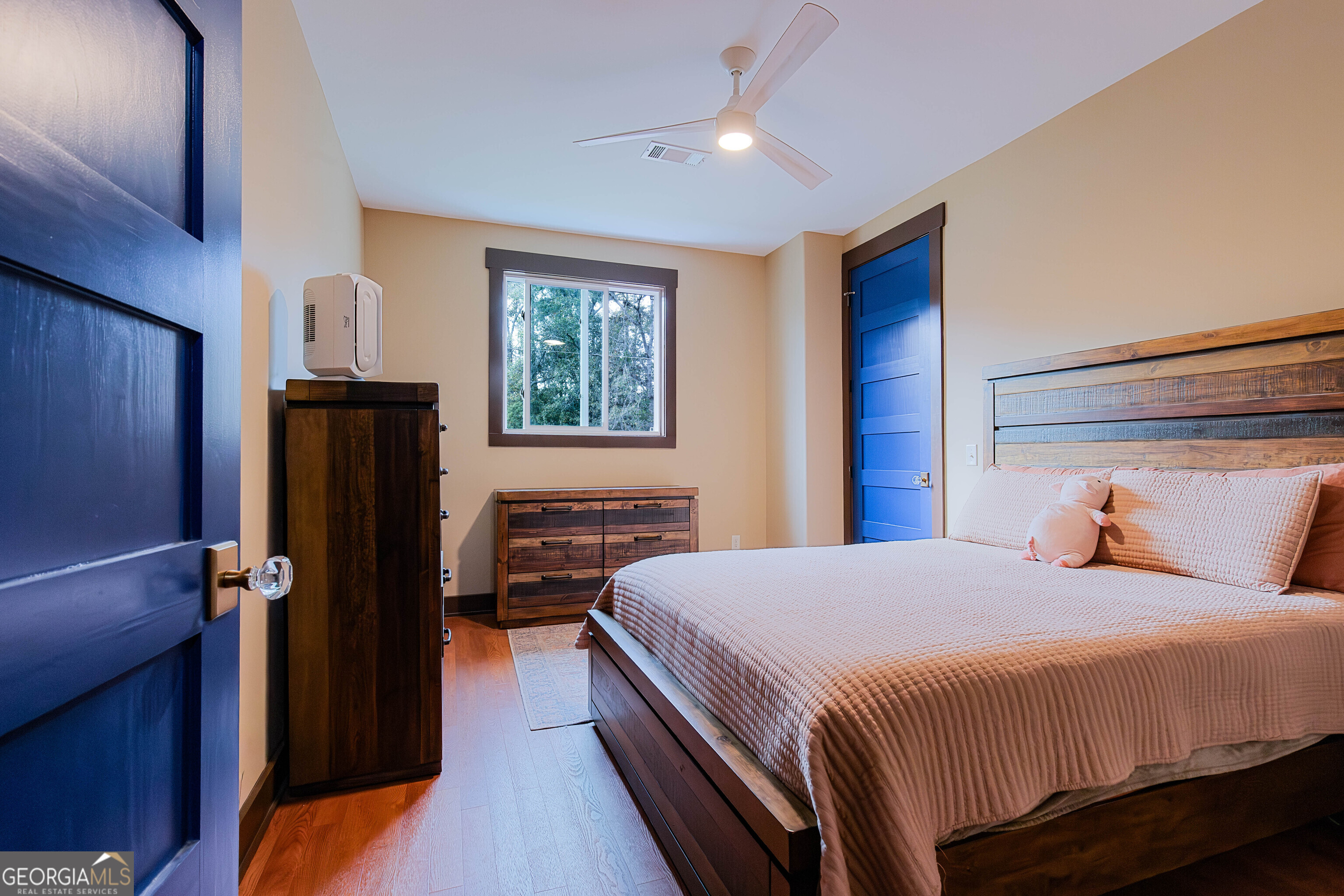 180 South Main Street Ludowici, GA 31316 - Photo 7 of 43 a bedroom with a bed and a dresser