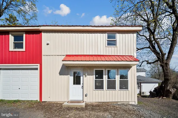 a view of a house with a garage