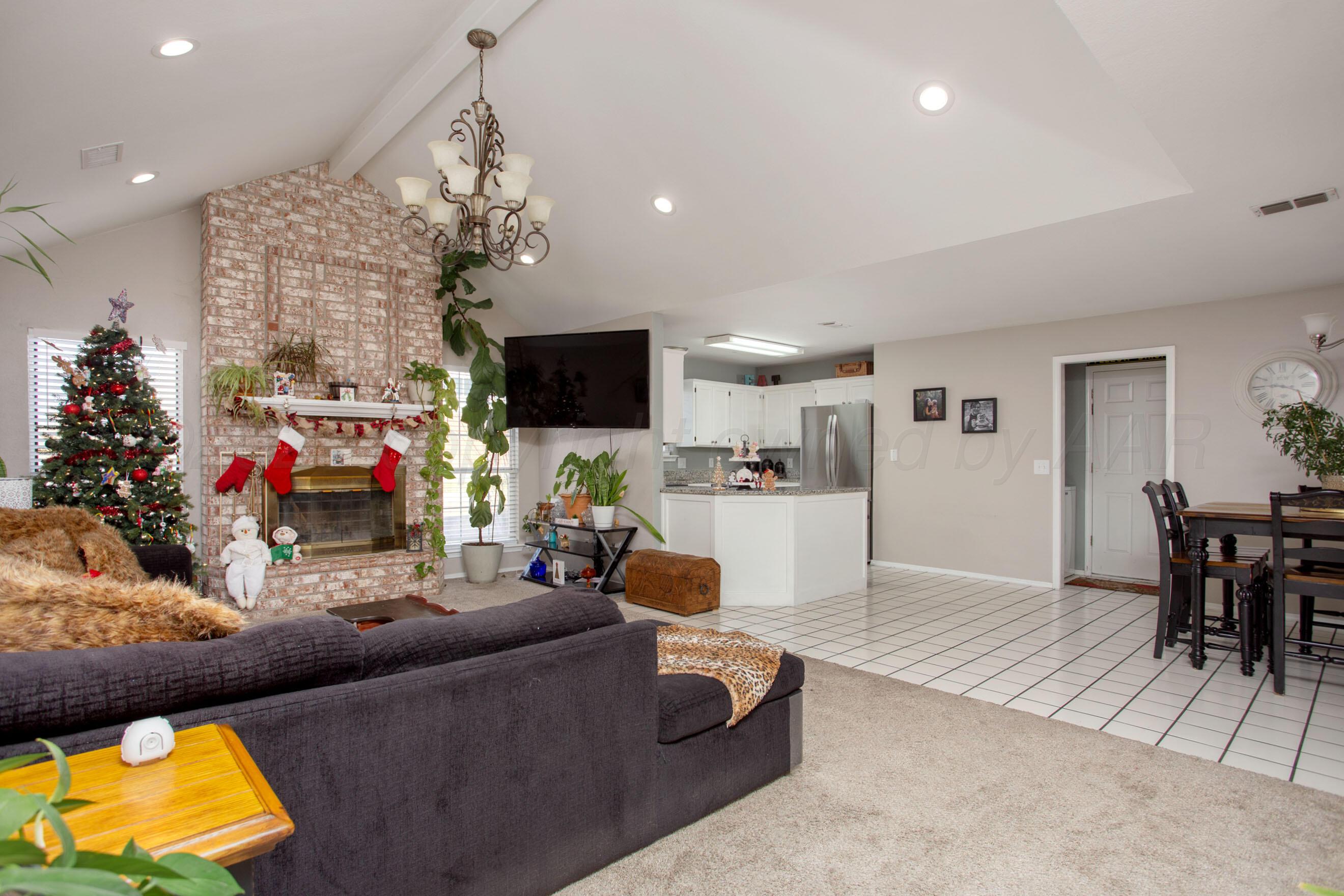 6712 Precision Place Amarillo, TX 79119 - Photo 3 of 29 6712 Precision - Living 2