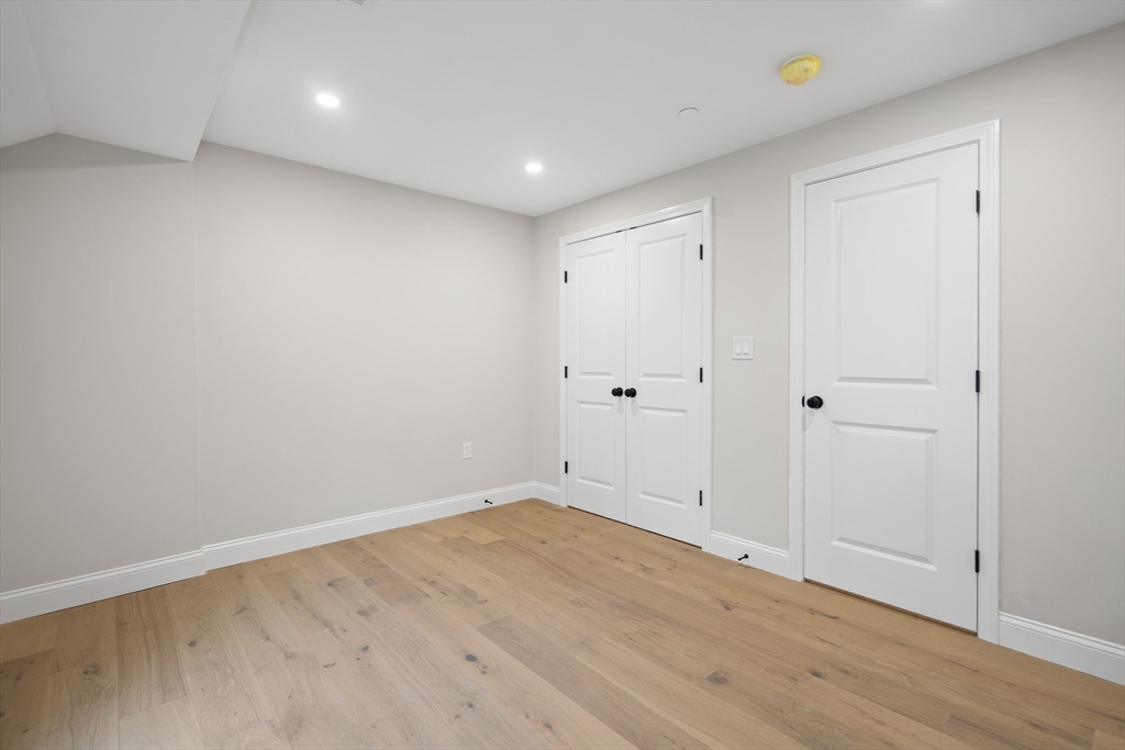 59 Nottinghill Road, Unit 59 Boston, MA 02135 - Photo 4 of 10 wooden floor in an empty room