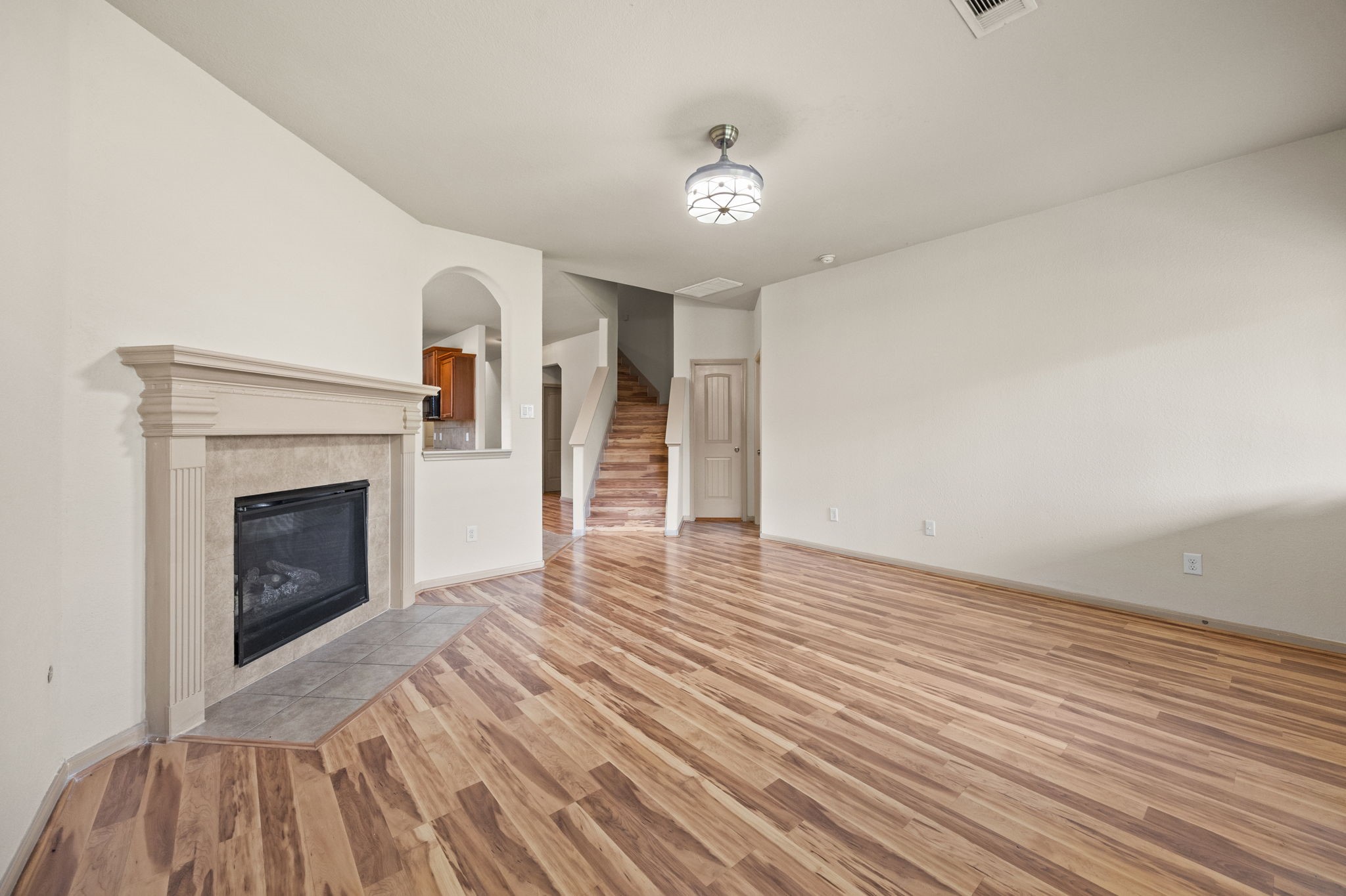 3606 Canvasback Lane Houston, TX 77047 - Photo 13 of 29 The spacious living area seamlessly connects to the backyard and kitchen, creating an ideal flow for gatherings and family time.