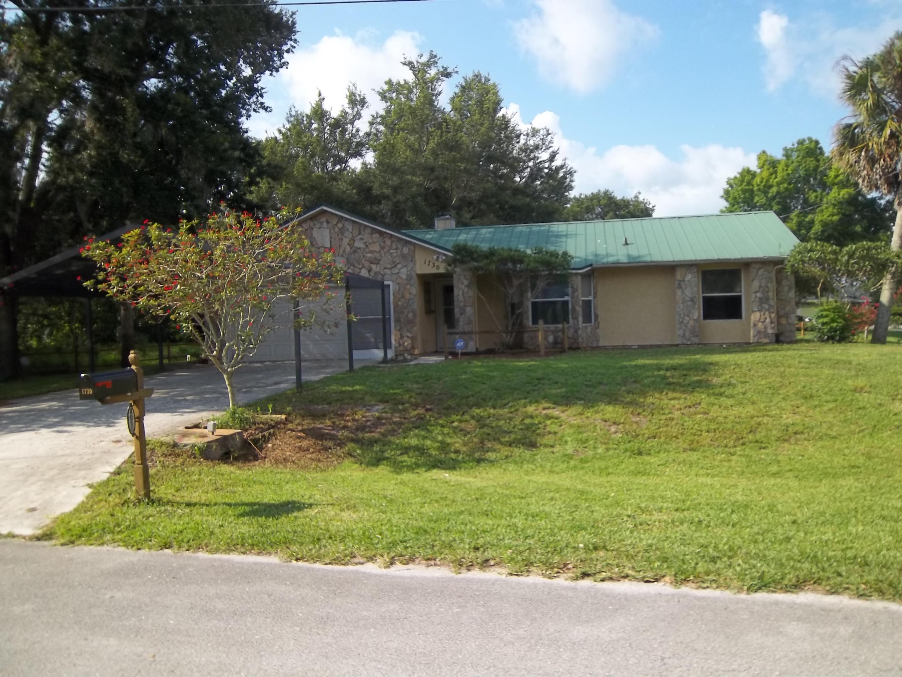 1730 Southwest Fortune Road Port St. Lucie, FL 34953 - Photo 1 of 19 Front