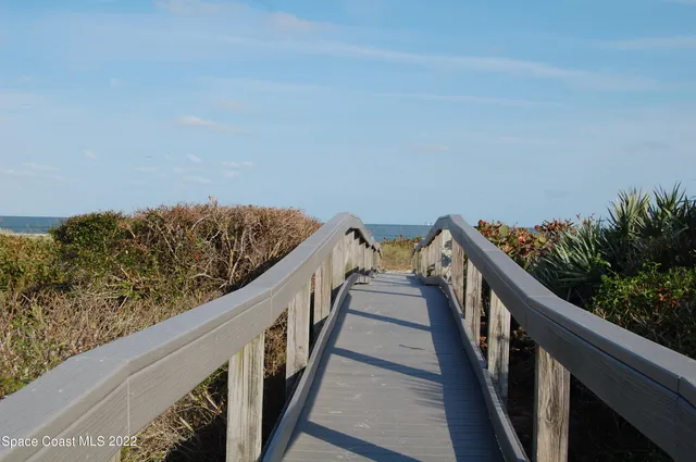 a view of balcony and yard