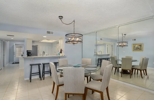 a view of a dining room with furniture