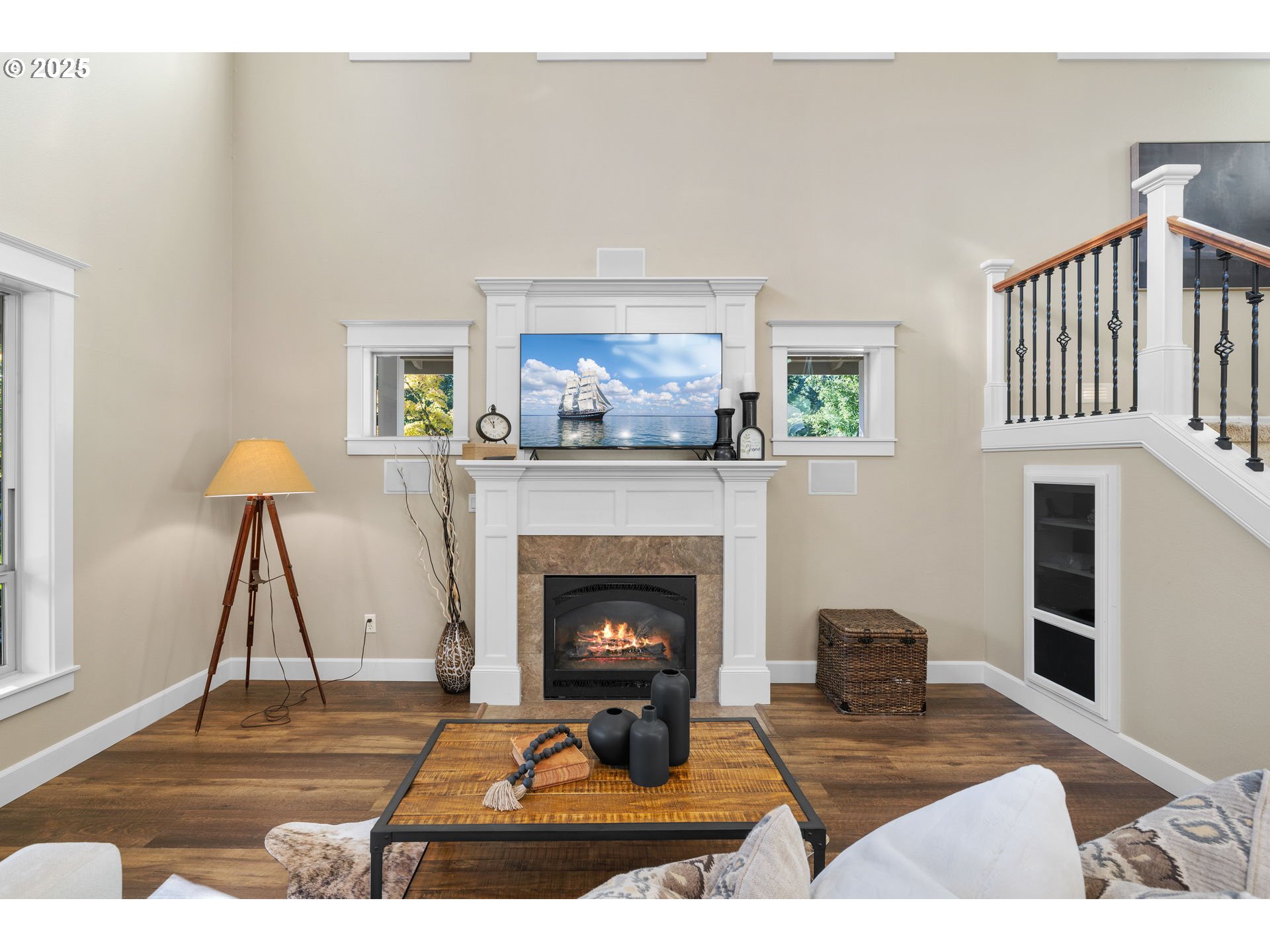 30010 Northeast 60th Street Camas, WA 98607 - Photo 11 of 48 a living room with furniture a fireplace and a flat screen tv