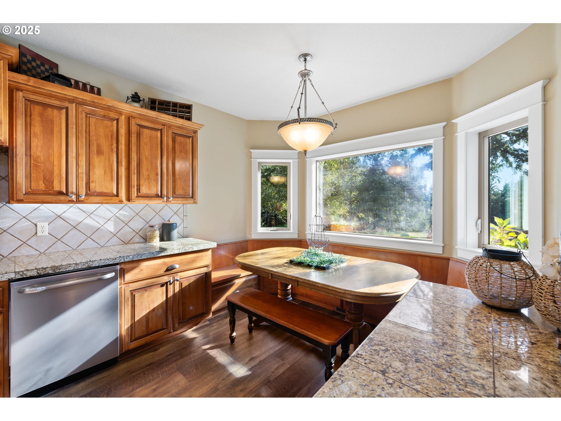 30010 Northeast 60th Street Camas, WA 98607 - Photo 17 of 48 a kitchen with a stove a sink and a wooden cabinets