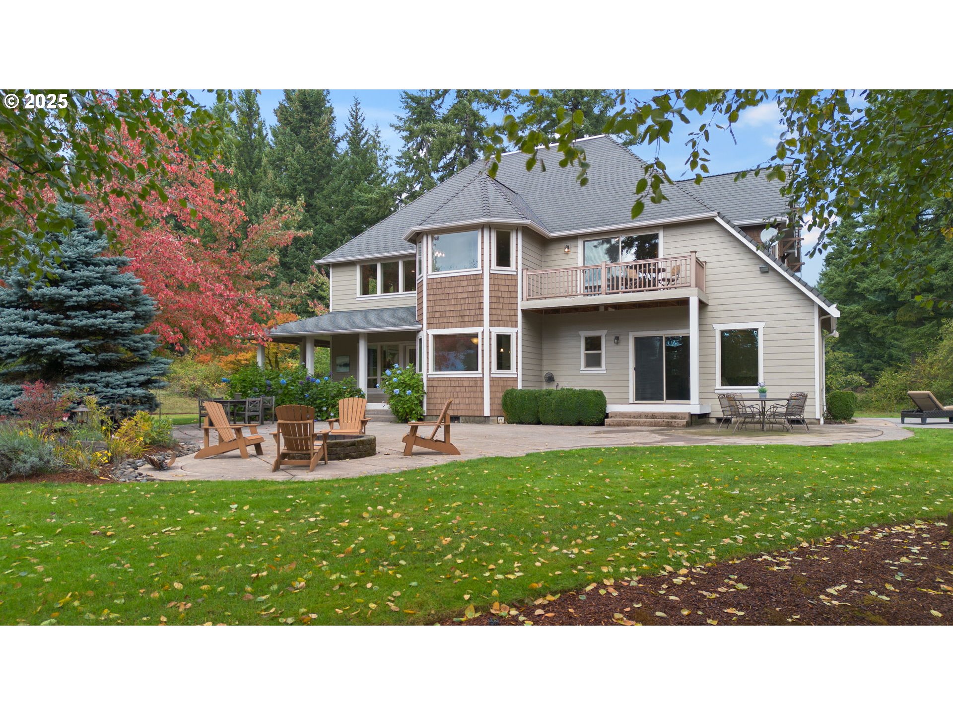 30010 Northeast 60th Street Camas, WA 98607 - Photo 2 of 48 a front view of a house with a garden and sitting area