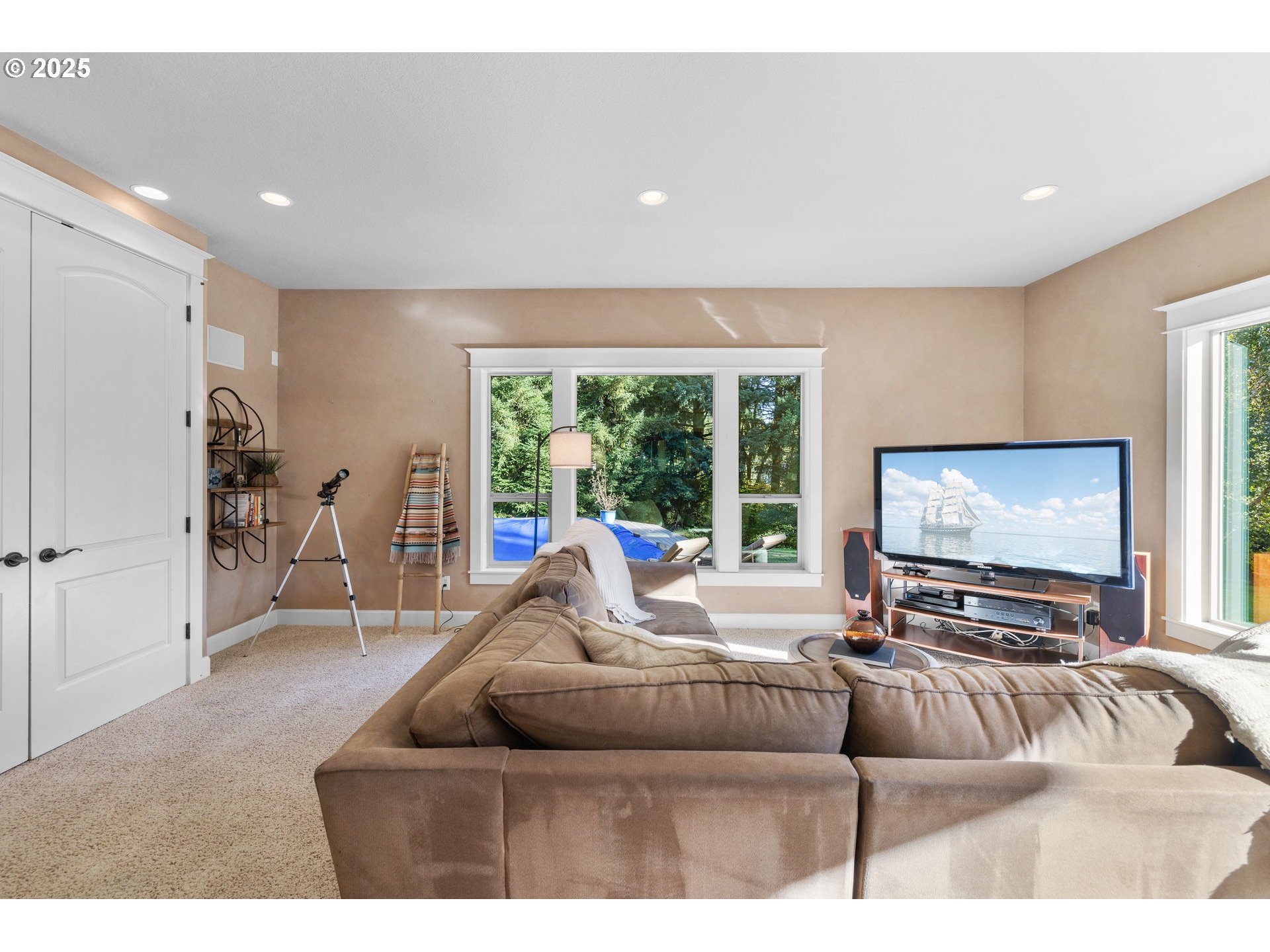 30010 Northeast 60th Street Camas, WA 98607 - Photo 22 of 48 a living room with furniture and a flat screen tv