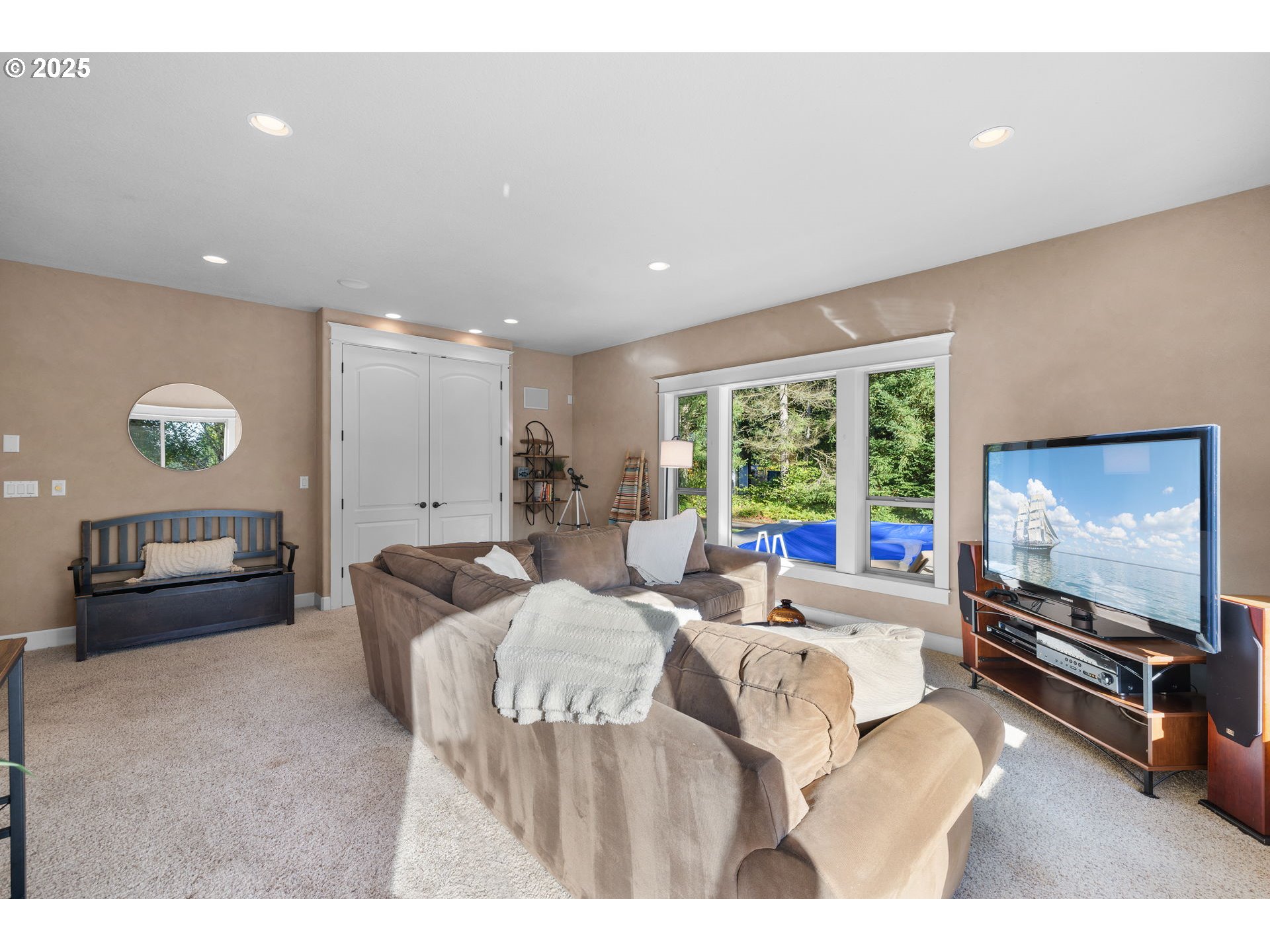 30010 Northeast 60th Street Camas, WA 98607 - Photo 23 of 48 a living room with furniture and a flat screen tv
