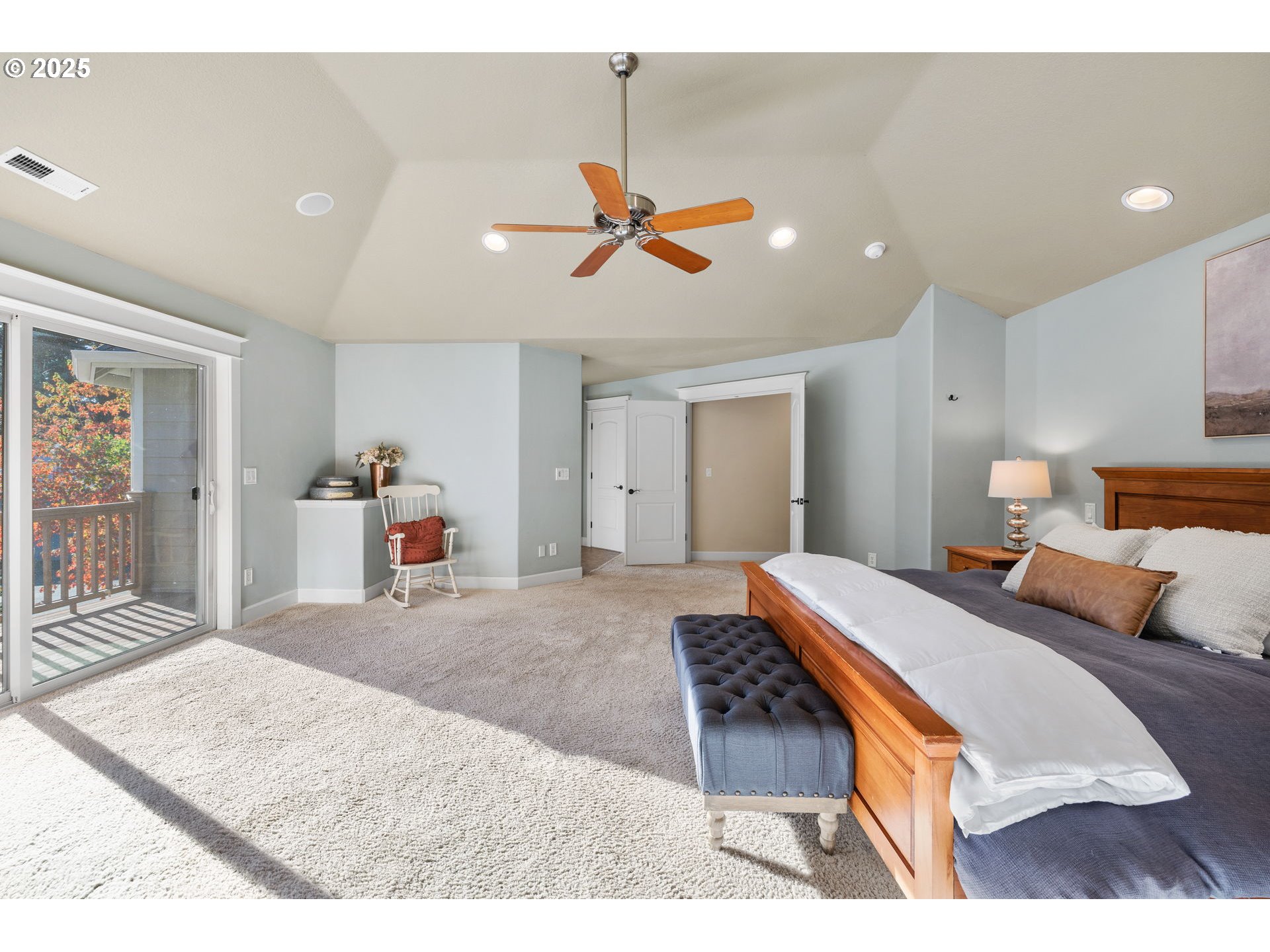 30010 Northeast 60th Street Camas, WA 98607 - Photo 29 of 48 a bedroom with a bed ceiling fan and a wooden floor