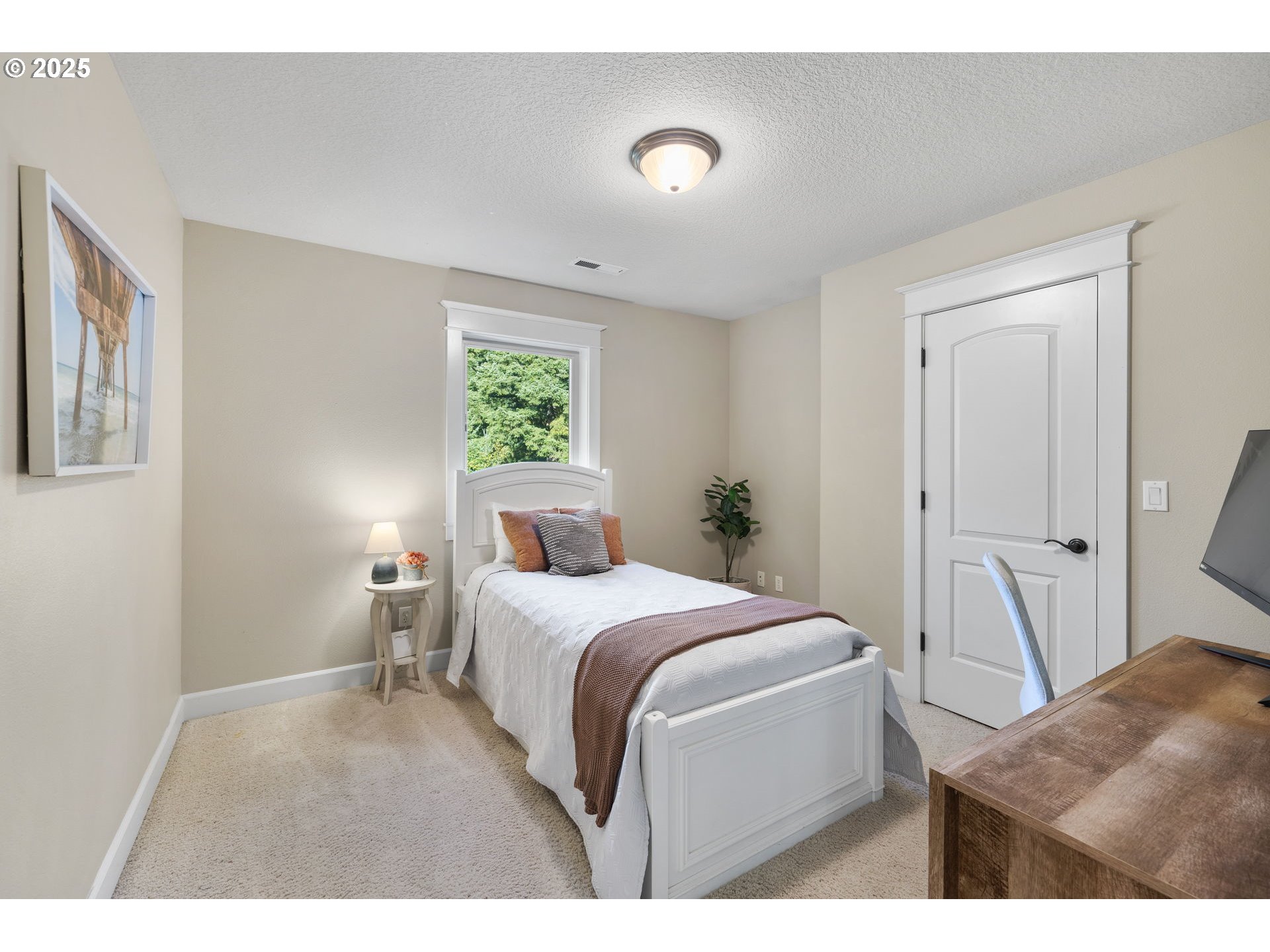 30010 Northeast 60th Street Camas, WA 98607 - Photo 36 of 48 a bedroom with a bed and a window