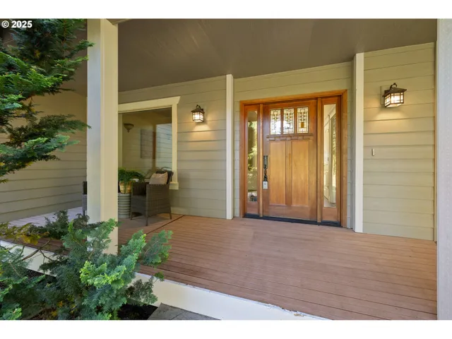 a view of a porch with wooden floor