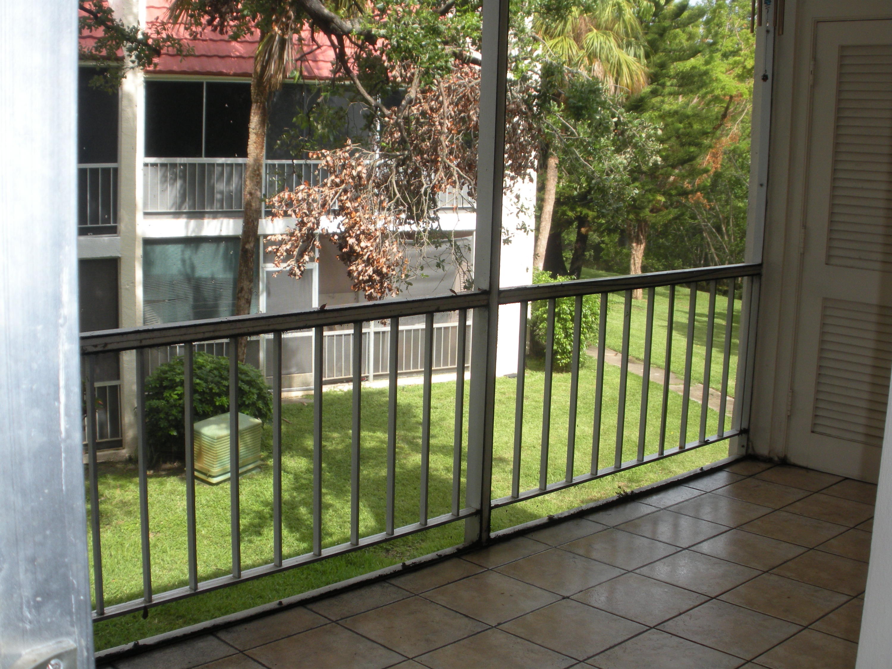 604 Northwest 13th Street, Unit 260 Boca Raton, FL 33486 - Photo 11 of 13 Screened & covered balcony