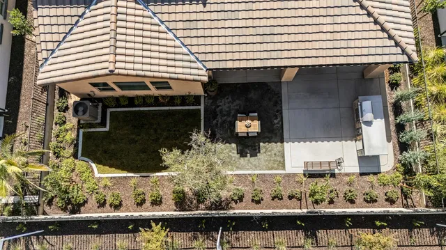 a front view of a house with trees