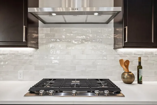 a close view of a stove a microwave and oven