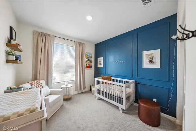 a room with a bed and a window