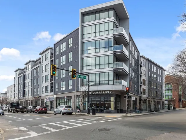 a front view of a building and a street