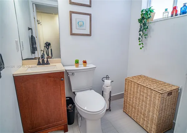 a bathroom with a toilet and a sink