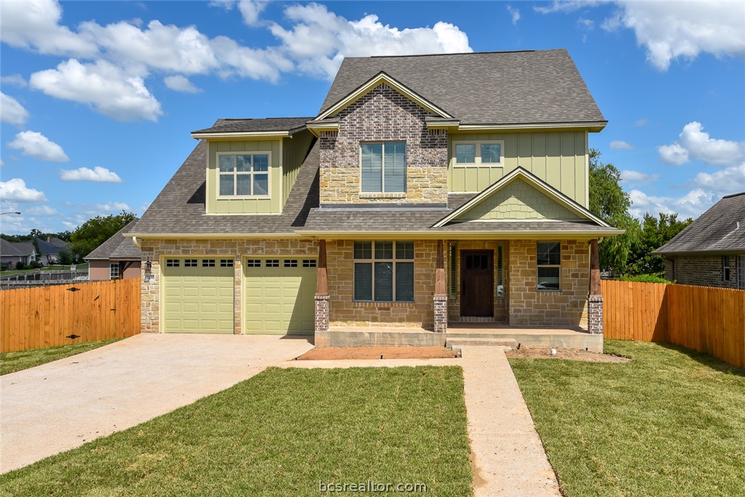 2136 Rockcliffe Loop College Station, TX 77845 - Photo 1 of 16 a front view of a house with a yard
