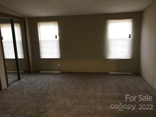 327 Rankin Hill Road Troutman, NC 28166 - Photo 7 of 9 an empty room with a window