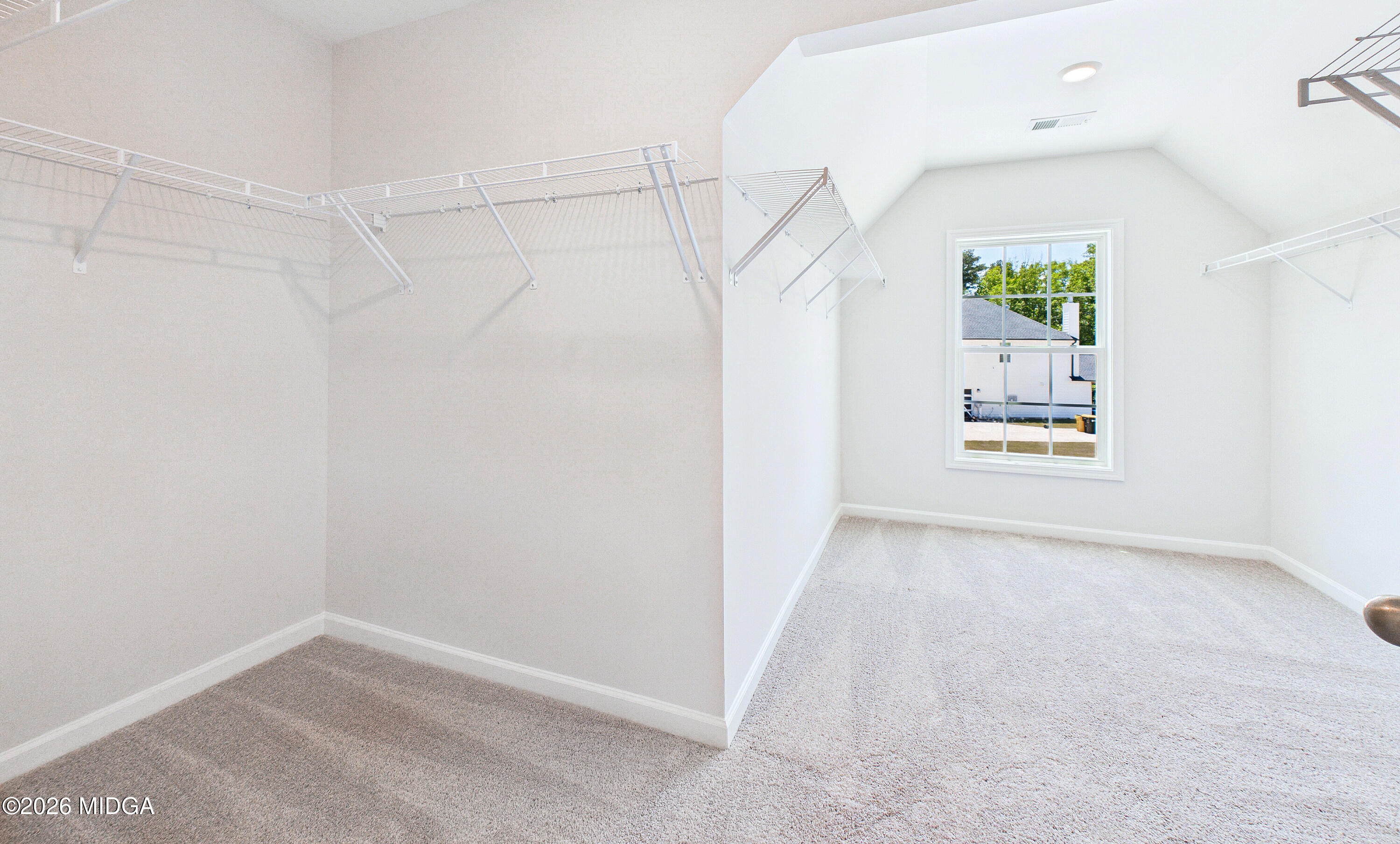 5393 Felles Way, Unit 359 Forsyth, GA 31029 - Photo 38 of 54 a view of an empty room with a window