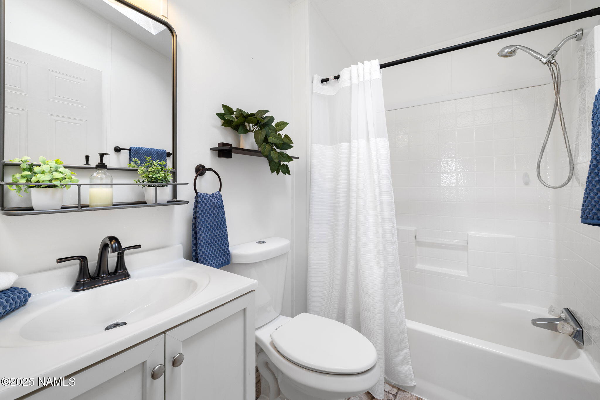 6792 South Quivero Road Williams, AZ 86046 - Photo 15 of 35 a bathroom with a sink a toilet and shower