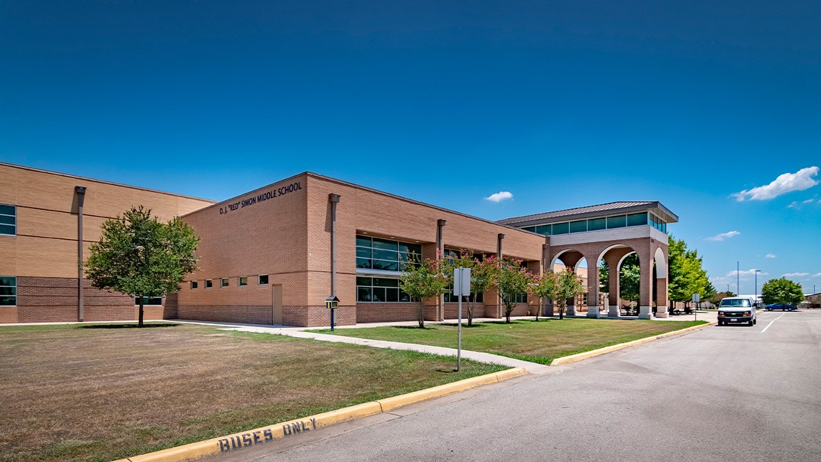 137 Varner Way Maxwell, TX 78656 - Photo 20 of 22 a view of a building with a yard