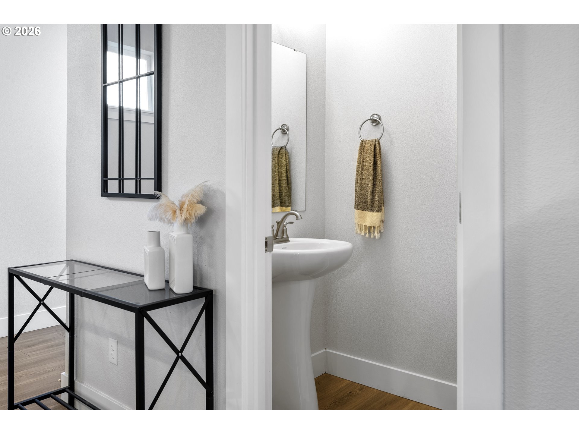 221 South 39th Drive Ridgefield, WA 98642 - Photo 18 of 35 a bathroom with a sink and a mirror