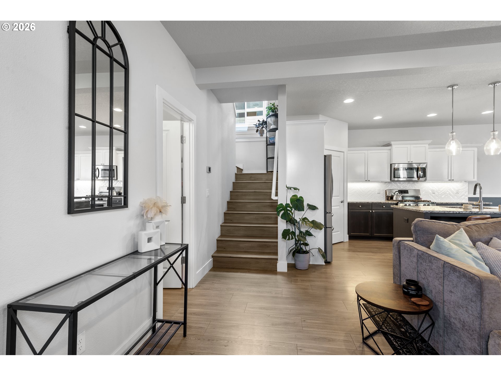 221 South 39th Drive Ridgefield, WA 98642 - Photo 19 of 35 a living room with furniture and wooden floor