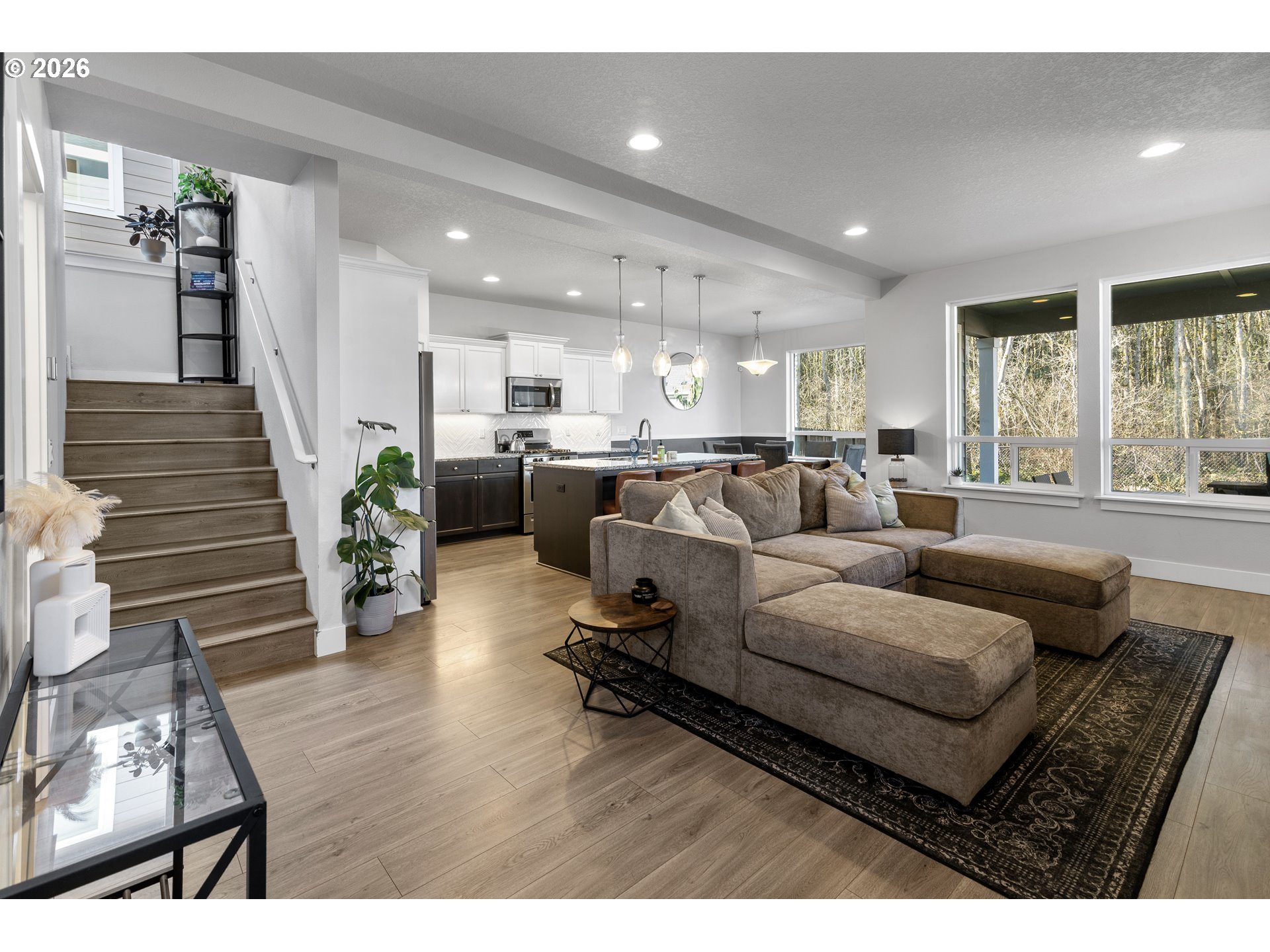 221 South 39th Drive Ridgefield, WA 98642 - Photo 5 of 35 a living room with furniture and a large window