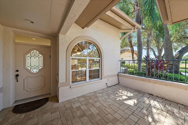 a view of entrance with wooden floor and fence